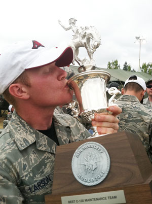 Larson with trophy